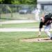 Milan senior third baseman Conner Berge picks up a ball with his bare hand during the game against Richmond on Friday, June 14. Daniel Brenner I AnnArbor.com